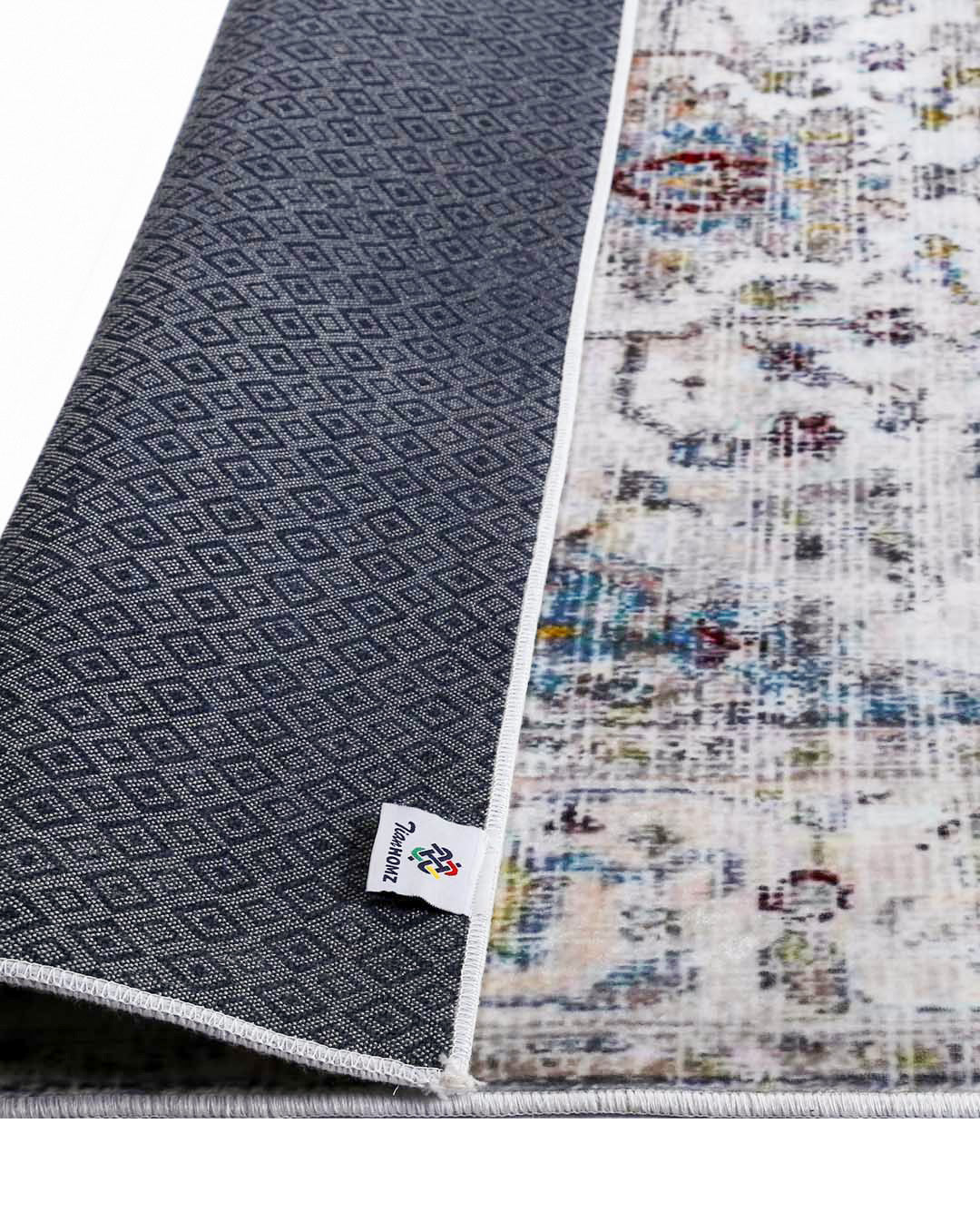 Weicher und glänzender Teppich Sama in Vintage-Beige mit Blumenmuster